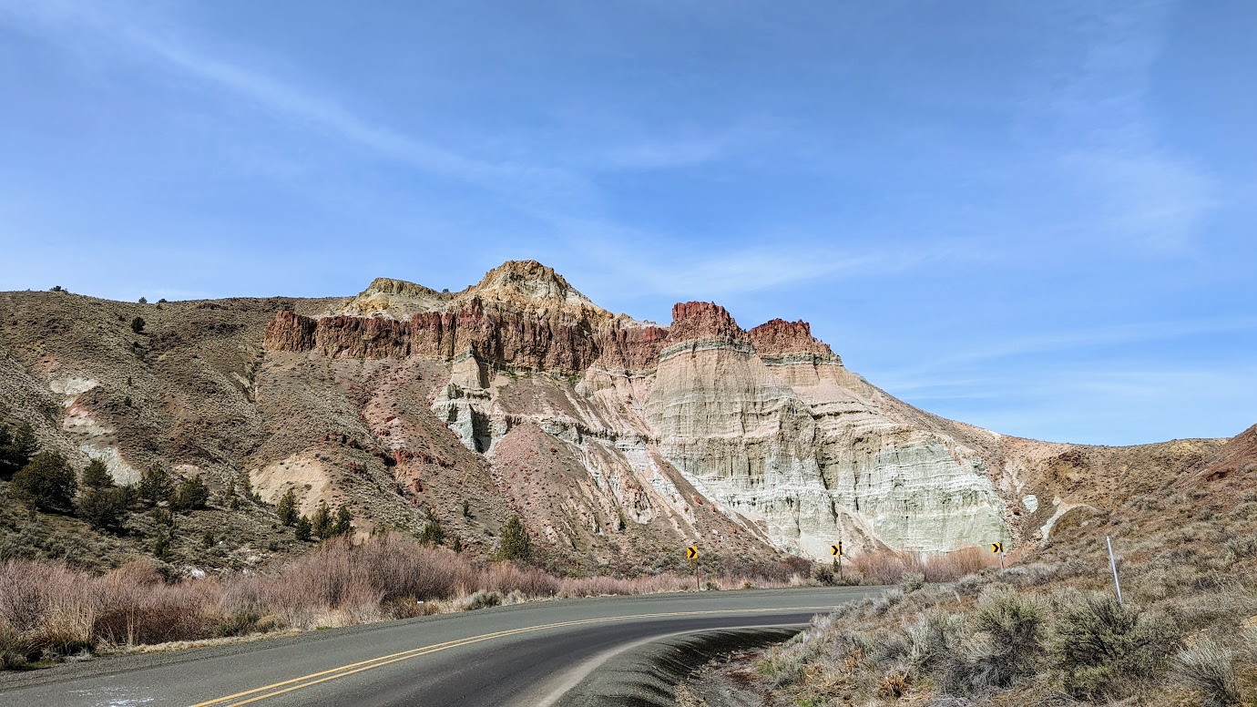 Visiting the Clarno Unit and Sheep Rock Unit - at Sheep Rock Unit, the Blue Basin is probably the most famous area, but another alternative is at the Foree Area with two shorter easier trails, one which is stroller/wheelchair accessible. One the way you will pass this prominent, multi-layered cliff face, Cathedral Rock