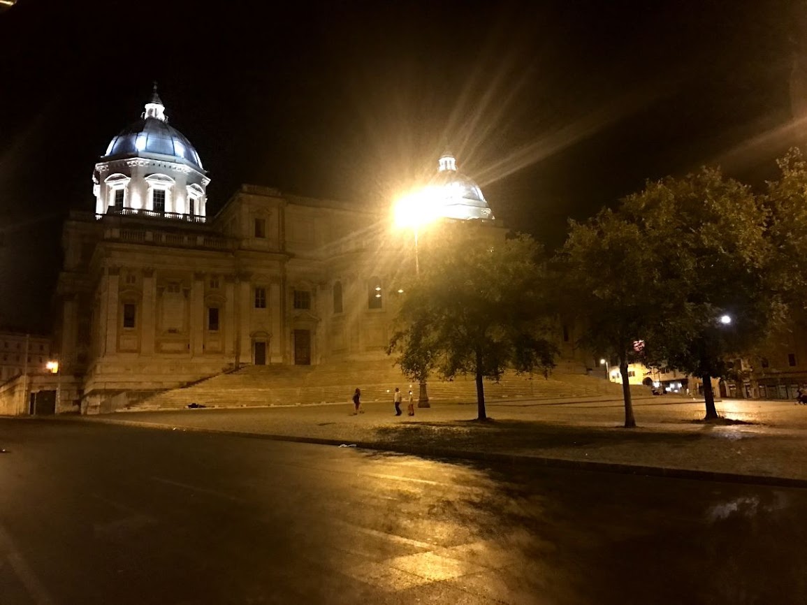 cycling through the streets of rome at night 