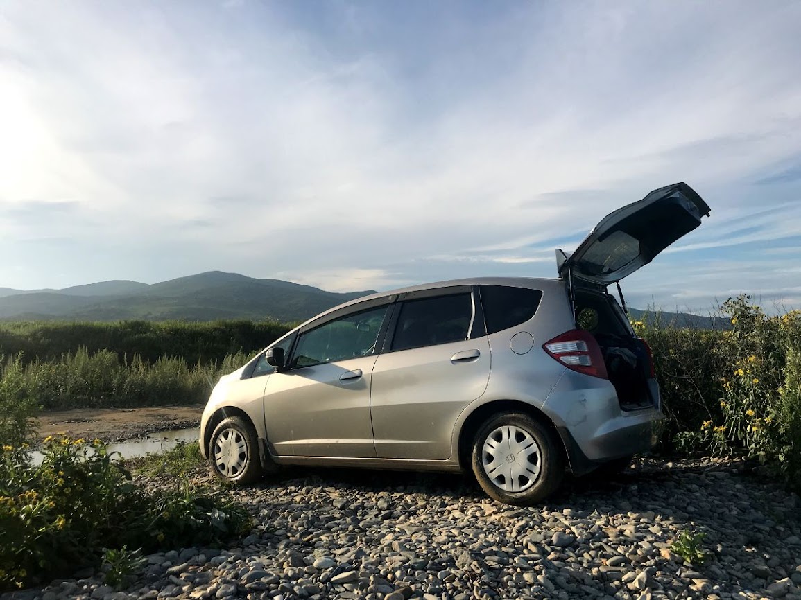 honda fit parked at beach