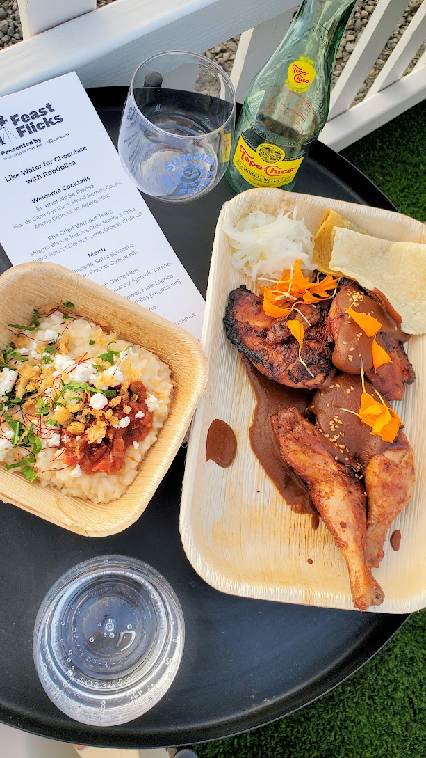 The Lot Zidell yards was the location for Feast Portland's Dinner and a Movie event, Feast Flicks. Republica and Like Water for Chocolate were the dinner and movie pairings for tonight. Here's Main of Cornish Game Hen, Mole Rojo de Cacahuate y Ajonjoli (peanuts and almonds and sesame), handmade masa tortillas served with a Side of Curtido (pickled relish); Side of Arroz Mexicano courtesy of Chef Matt Sigler helping out his bestie Chef Lauro Romero