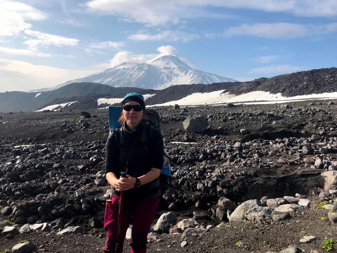 trekking nalychevo national park kamchatka girl posing in front of Avachinsky Volcano