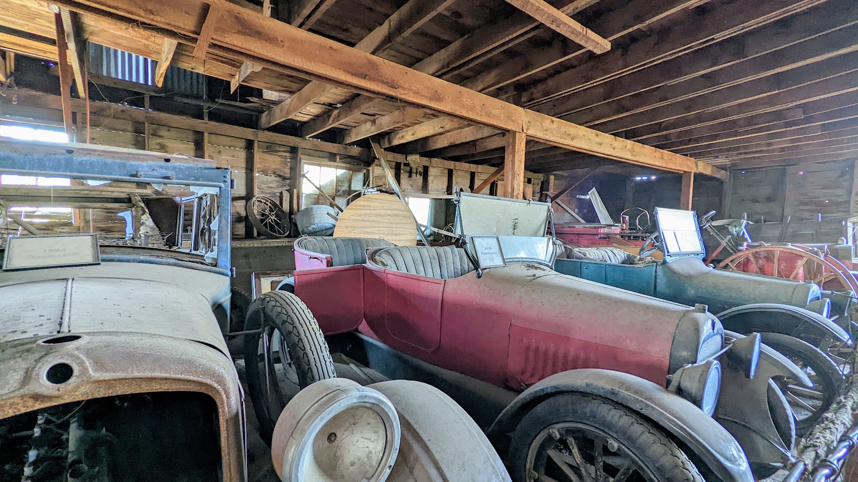 Planning a Trip to the Painted Hills - we opted to take 97 as part of the Journey Through Time Scenic Byway from Portland through Shaniko where we saw this across the street the Wagon Yard - the Shaniko Livery Barn, free to visit/requested donation box viewing of vehicles from the past