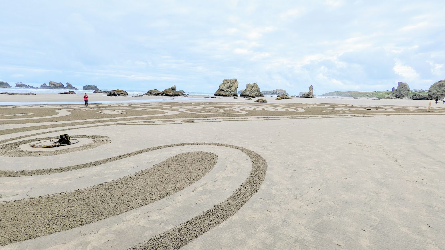 Circles in the Sand at the Oregon Coast - looking down at the labyrinth from Face Point Scenic Viewpoint in Bandon, draw from June 17 2022