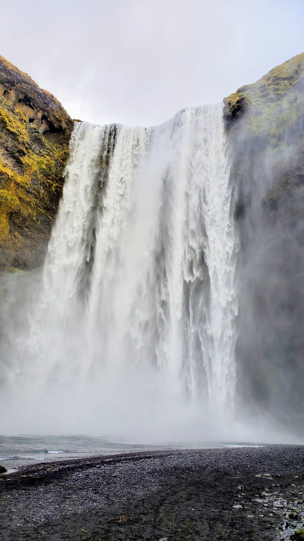 South Iceland Waterfalls and Black Sand Beach: Skogafoss Waterfall is one of the biggest waterfalls in Iceland, with a drop of some 60 meters and a width of 25 meters