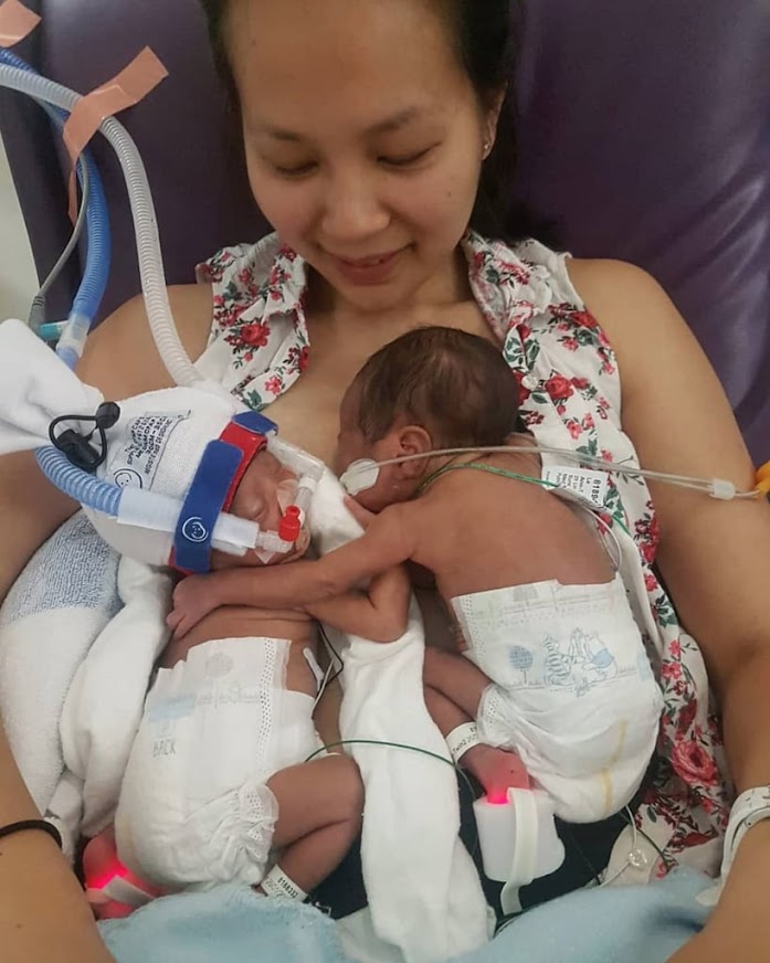 Mother, 29, Who Gave Birth To Very Premature Twins Shares A Heartwarming Photo Of The Separated Siblings 'Hugging' Each Other When Reunited For The First Time