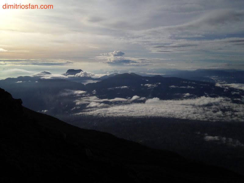 View of Mount Tuju from the top of mount kerinci