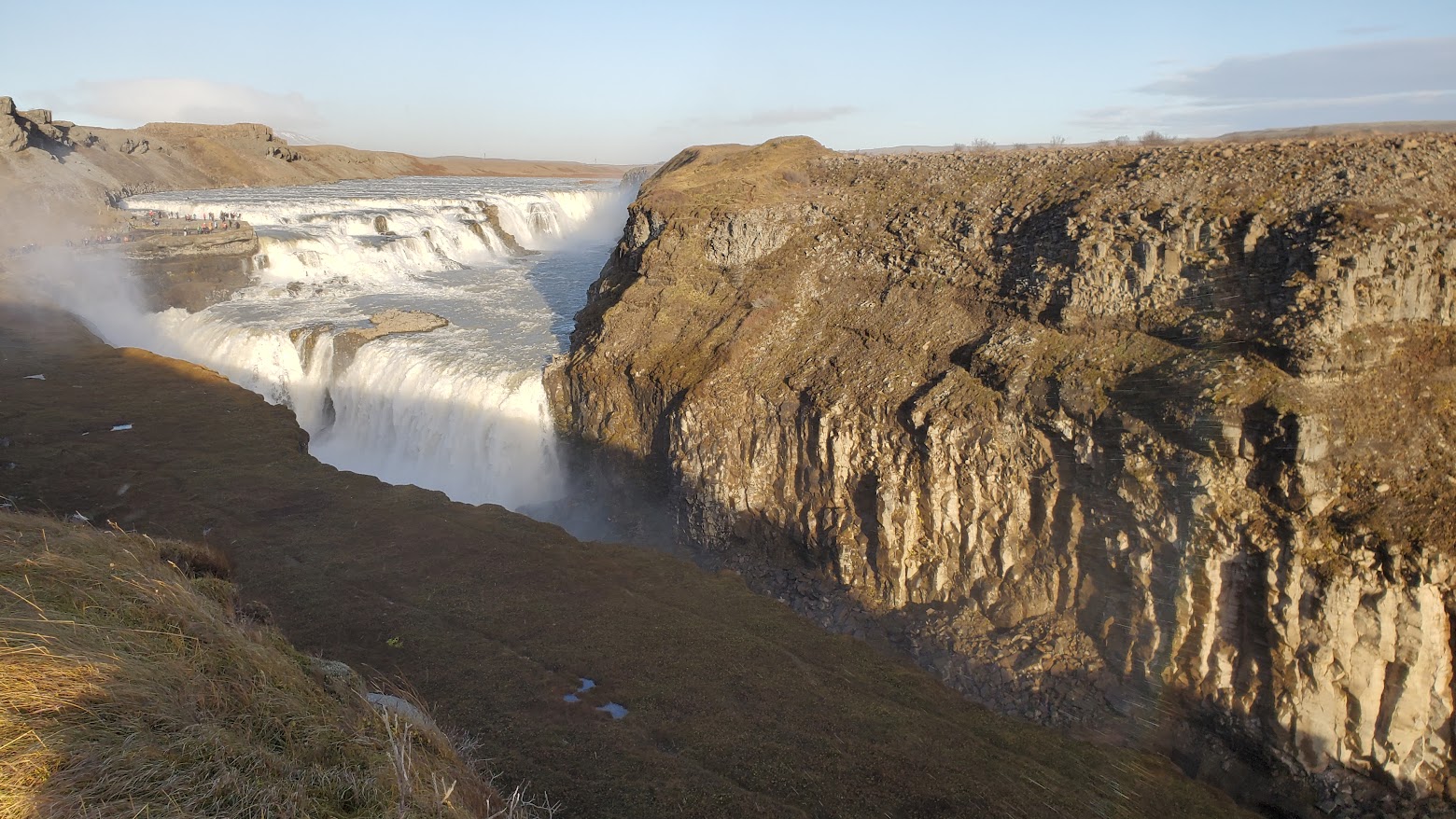 Golden Circle Highlights, Iceland: Gullfoss, or Golden Falls, unique as the waterfall plunges into a gorge so it seems to disappear into the earth