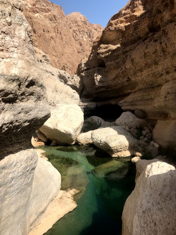 trekking inside wadi shab canyon oman