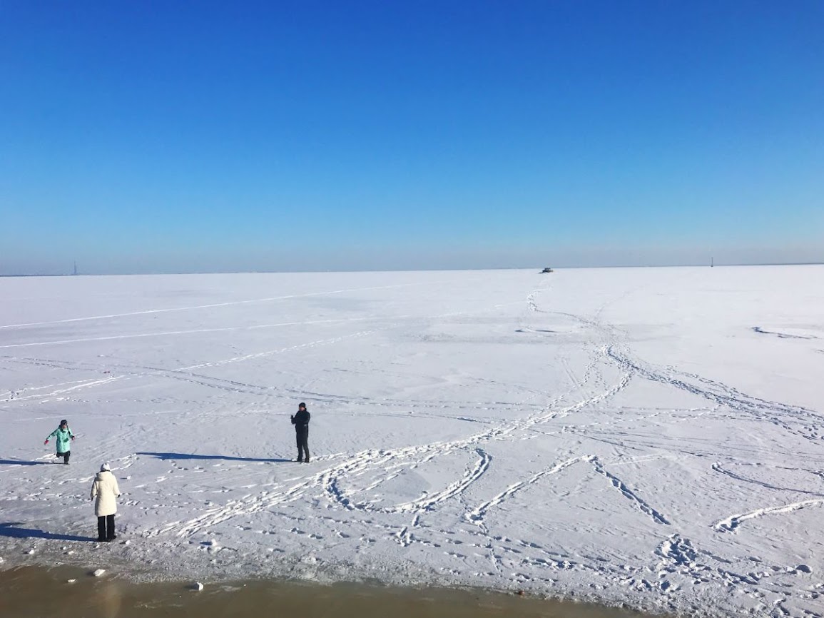 Vast expanse of frozen sea off the fort in kronstadt gulf of finland 