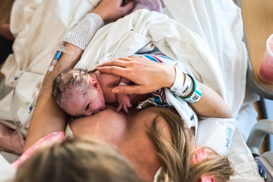 Mom's Reaction to Holding Her Newborn Rainbow Baby is So Powerful