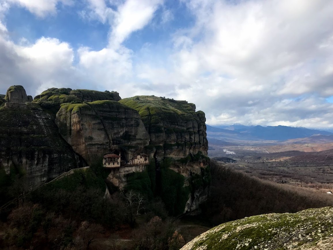 The Monastery of Ypapanti in meteora from the distance and extended view to the valley