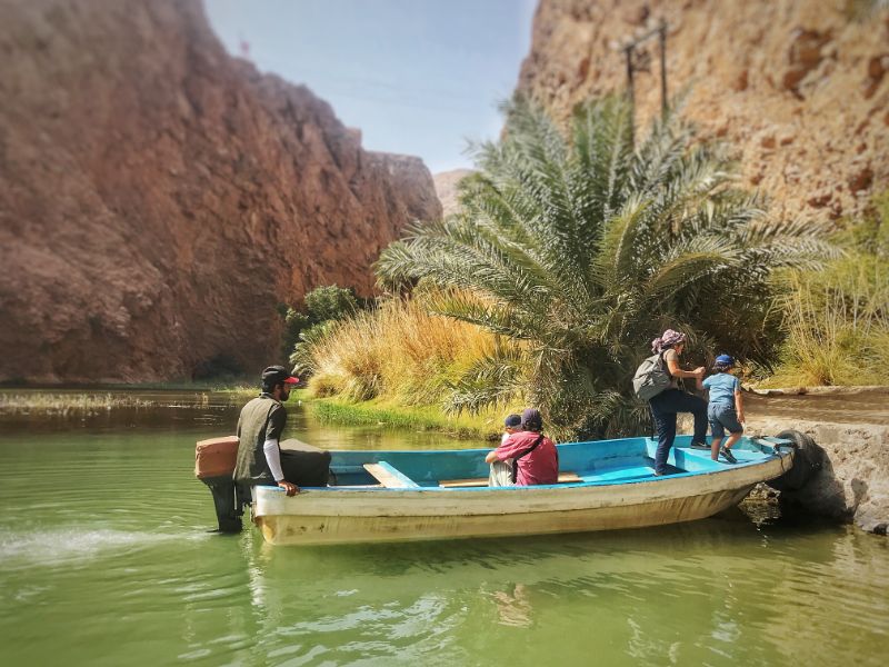 Short boat ride to the opposite bank of wadi shab entrance oman