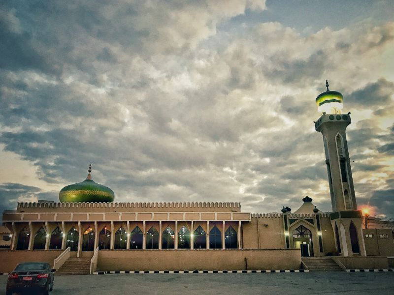 salalah mosque with green dome at daybreak