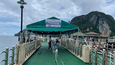 Check in at the ferry counter at Ton Sai Pier