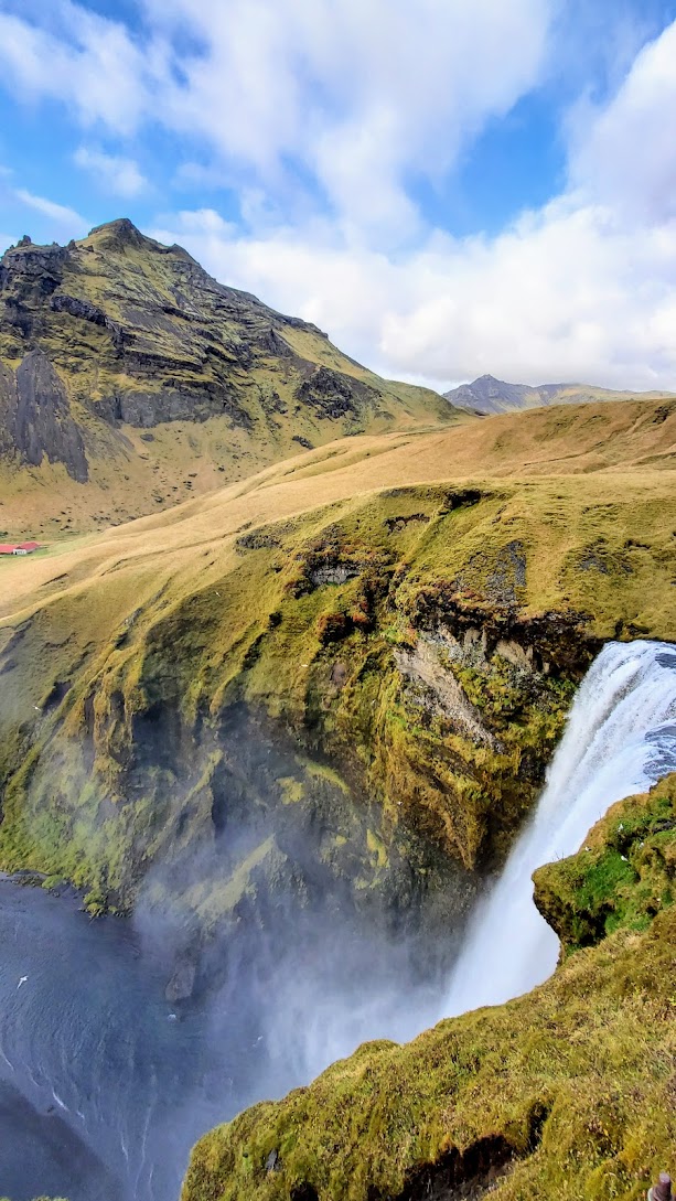 South Iceland Waterfalls and Black Sand Beach: Skogafoss Waterfall is one of the biggest waterfalls in Iceland, with a drop of some 60 meters and a width of 25 meters. On the right side (facing the waterfall), steps lead up to an observation platform above Skógafoss