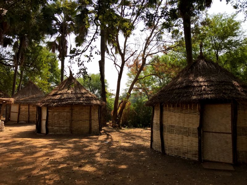 straw huts in niokolo koba national park 