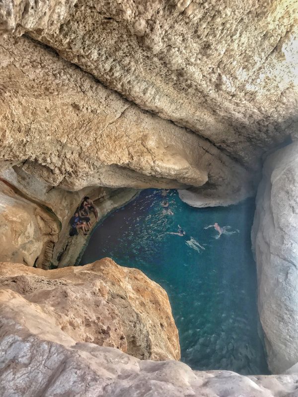 wadi shab oman cave seen from above