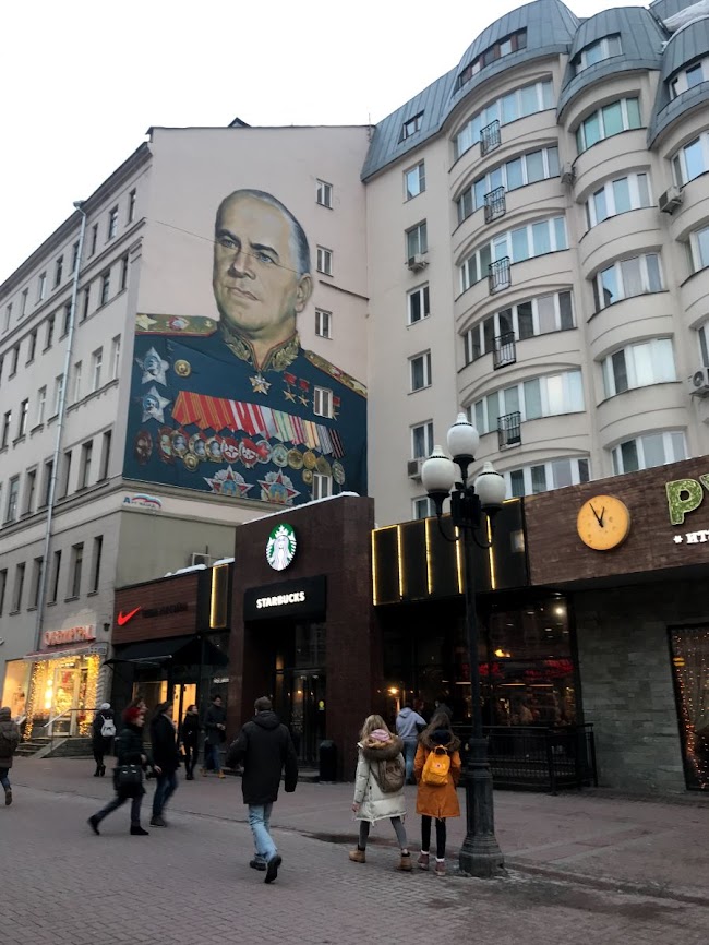 Mural of a general or something with lots of military decorations in arbat street moscow