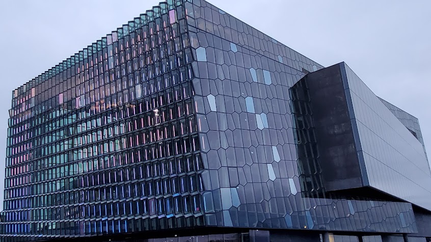 In Reykjavik Iceland, one early morning thing to do that is free is visiting Harpa Concert Hall. The honeycomb glass exterior is mesmerizing how the windows change colors in daylight or in the night.