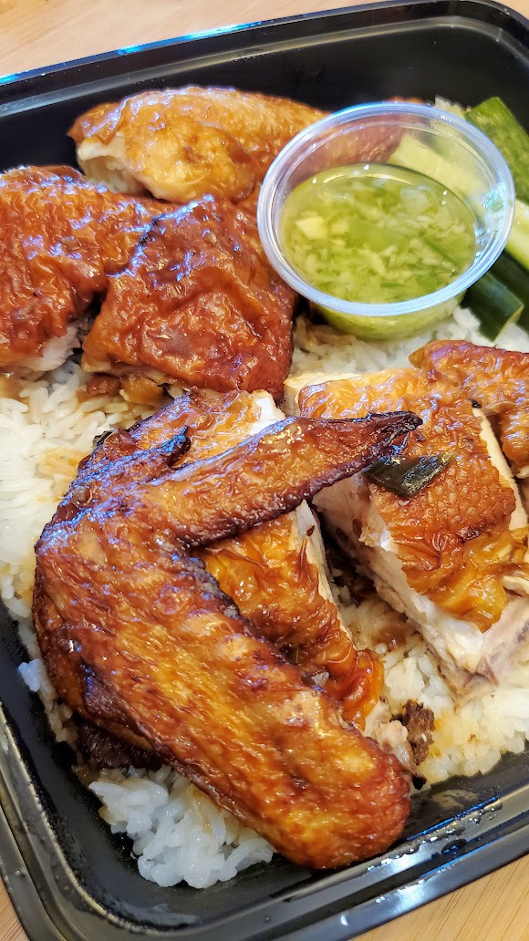 YāYā Portland bringing accessible Chinese barbecue in Portland - Soya sauce chicken comes in half or whole and is marinated in house soya sauce, and served with that ginger garlic sauce is very complimentary to add to the rice