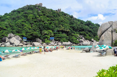 Beach time at Koh Nangyuan with a plenty of sunbeds and umbrellas