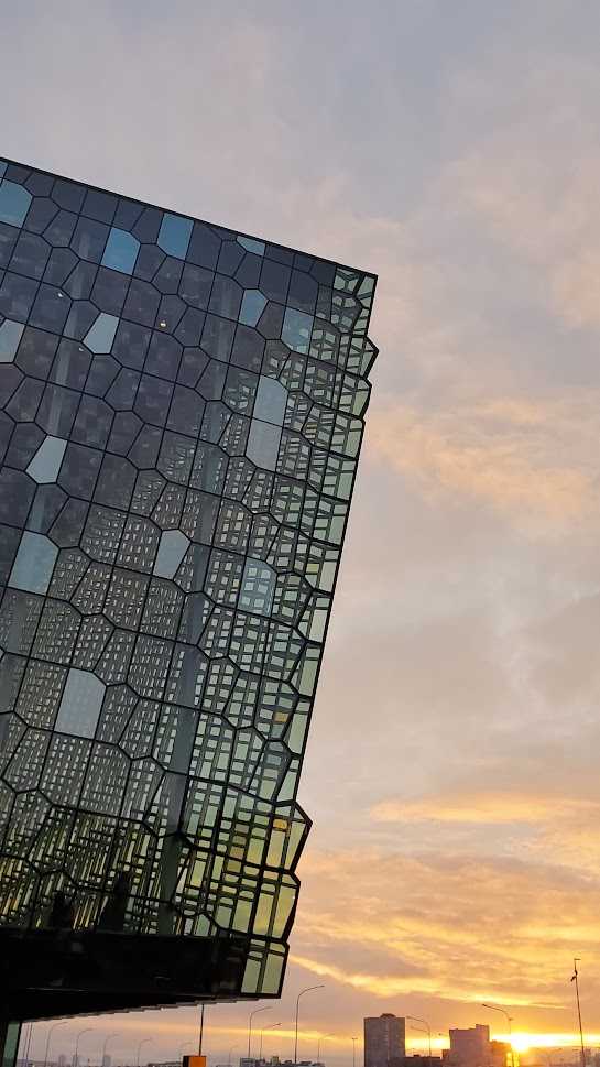 In Reykjavik Iceland, one early morning thing to do that is free is visiting Harpa Concert Hall. The honeycomb glass exterior is mesmerizing how the windows change colors in daylight or in the night.