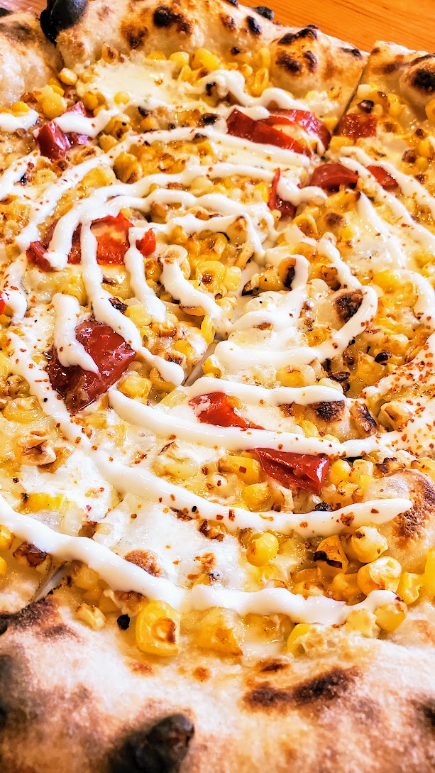 Ken's Artisan Pizza Seasonal Corn Pizza: includes mozzarella, fontina, mama lil' peppers, tajin seasoning, and crema