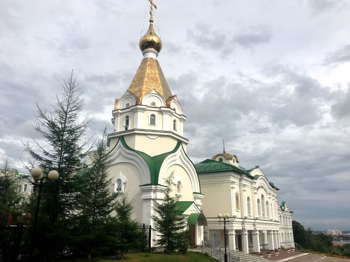 A church and some sort of school beside transfiguration cathedral khabarovsk