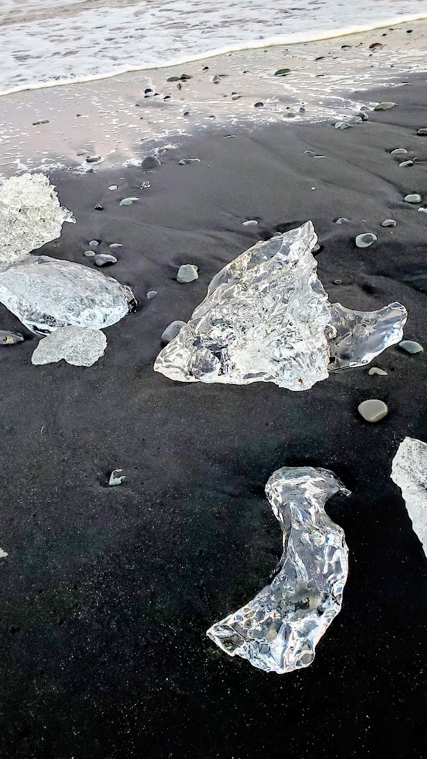 Glaciers and Diamond Beach: In the southeast coast of Iceland you can find the famous Diamond Beach, where icebergs from Jökulsárlón Glacier Lagoon have been polished to translucence by the ocean waves so they look almost like diamonds, then wash ashore on the black sand beach