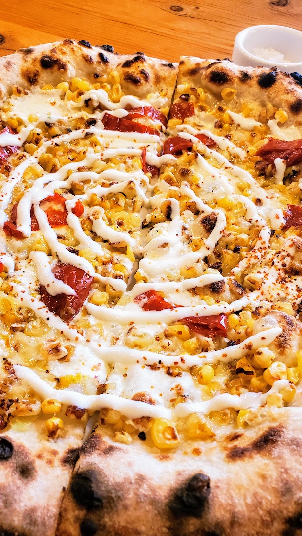 Ken's Artisan Pizza Seasonal Corn Pizza: includes mozzarella, fontina, mama lil' peppers, tajin seasoning, and crema