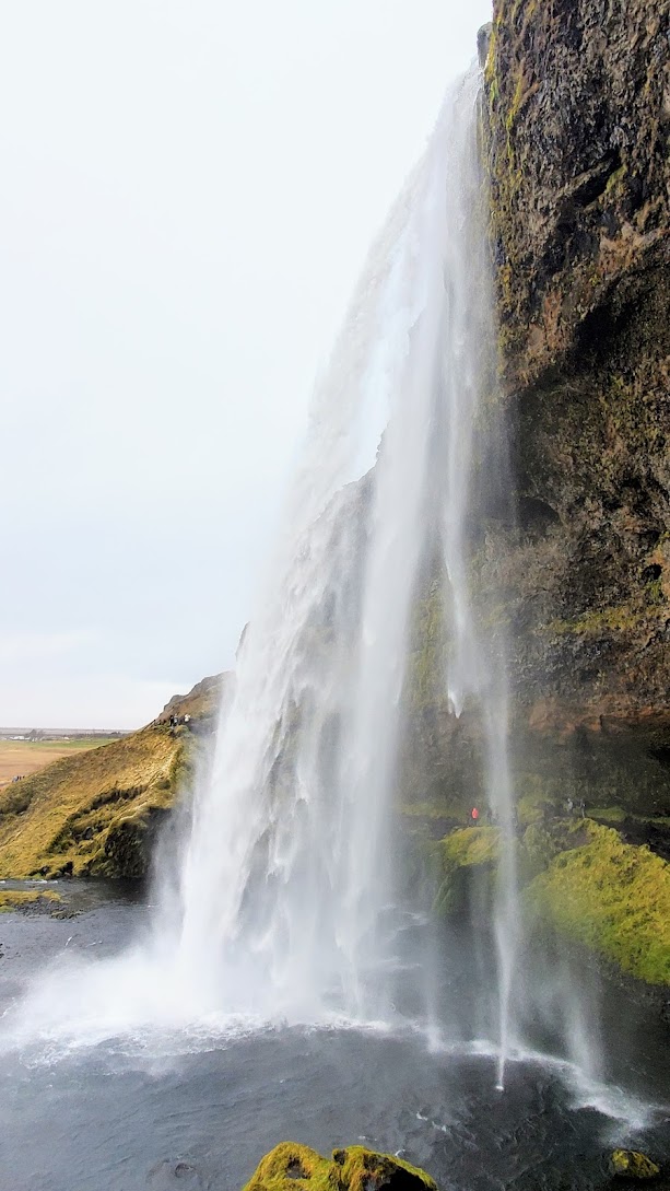 South Iceland Waterfalls and Black Sand Beach: Seljalandsfoss. This waterfall is well known because this is a waterfall you will be able to walk behind