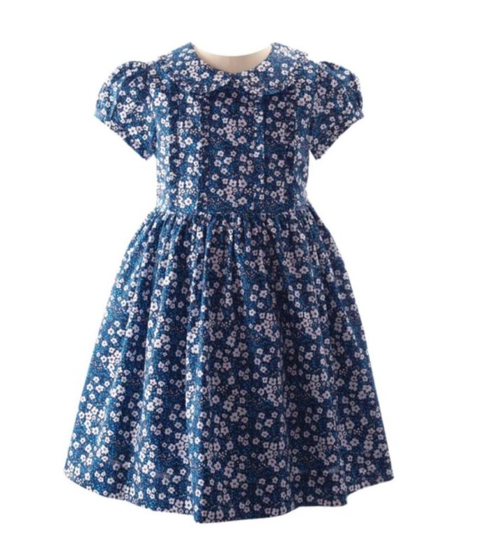 Princess Charlotte was looking cute as a button in a blue Rachel Riley Mini floral frill dress.