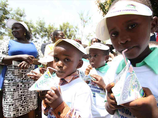 Pupils of Kunene Primary School in Tigania West, Meru county, enjoy free milk provided by governor Kiraitu Murungi's administration, February 5., 2018. /Gerald Mutethia