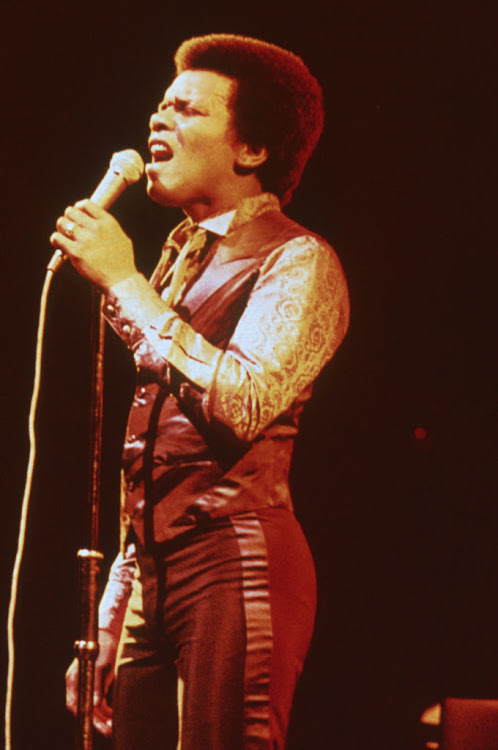 Johnny Nash, performing in London, circa 1975. Nash's son has confirmed that the singer has passed away.