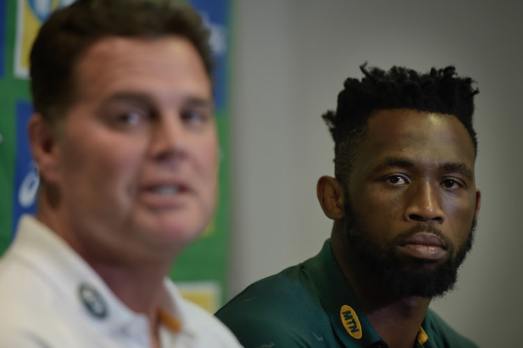 Springboks coach Rassie Erasmus with captain Siya Kolisi during the the team's departure media conference in Fourways, north of Johannesburg on August 29 2019.