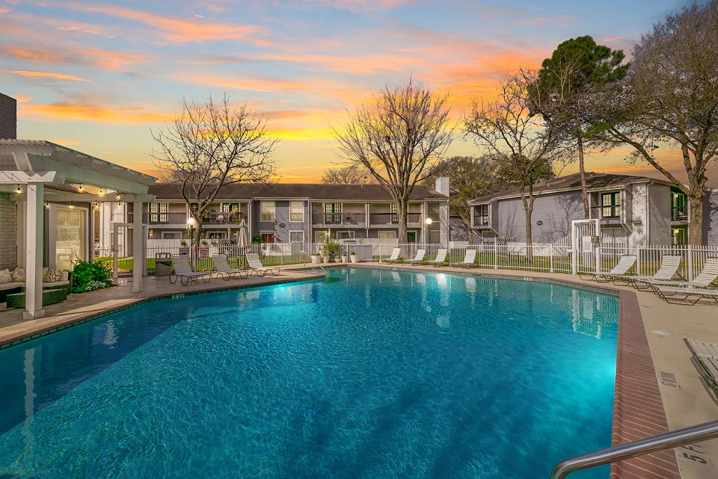 Lakewood sparkling community pool at dusk