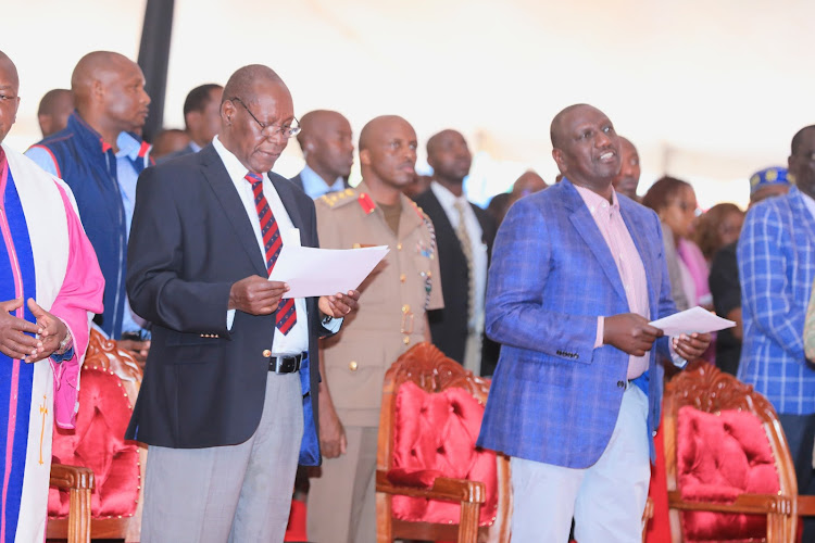 Kitui Governor Julius Malombe and President William Ruto during the thanksgiving service at Kitui Central Primary school on Sunday.