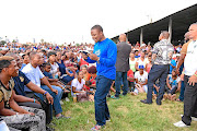 Shepherd Bushiri, seen here preaching, is out on bail after being charged with, among others,  fraud.