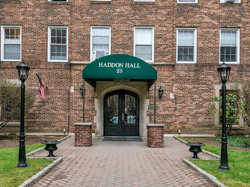 Brick building entrance double doors in this luxury apartment / penthouse for sale in Bronxville ($679,000)
