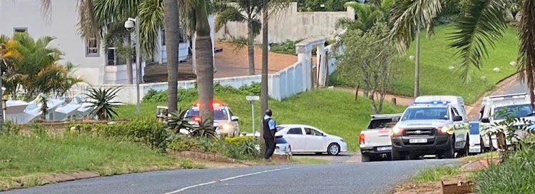 Emergency services and police outside Shauwn Mkhize's house in Addison Drive, La Lucia.