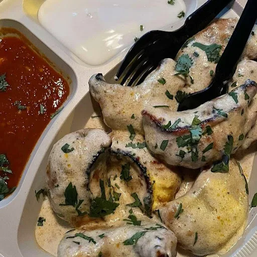 Veg. Malai Momos