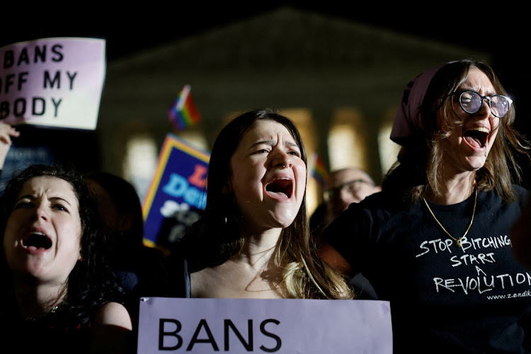 Pro-abortion rights protesters react outside the US Supreme Court after the leak of a draft majority opinion written by Justice Samuel Alito preparing for a majority of the court to overturn the landmark Roe vs Wade abortion rights decision later this year, in Washington, the US, on May 2 2022. Picture: REUTERS/JONATHAN ERNST