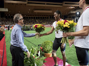 John Capriotti director of athletics at Nike congratulate South Africa's Caster Semenya at the IAAF Diamond League athletics 'Herculis' meeting at The Stade Louis II on July 20, 2018 in Monaco, Monaco.