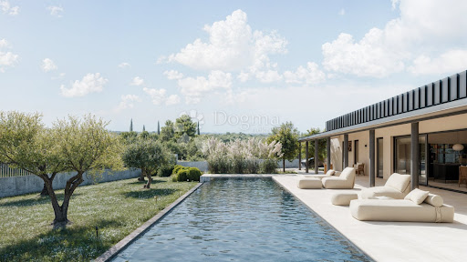 Pool and garden with modern house in this luxury property for sale in Buje ($1,601,292 - 333 m²)