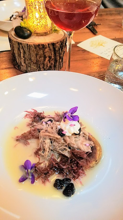 Fimbul Icelandic Dinner Spring 2018, Hay-smoked duck, Skyr, preserved huckleberries in whey, a broth of dulse and whey, rye dumpling. Inspired by how the North Arctic area early culture ate sea birds