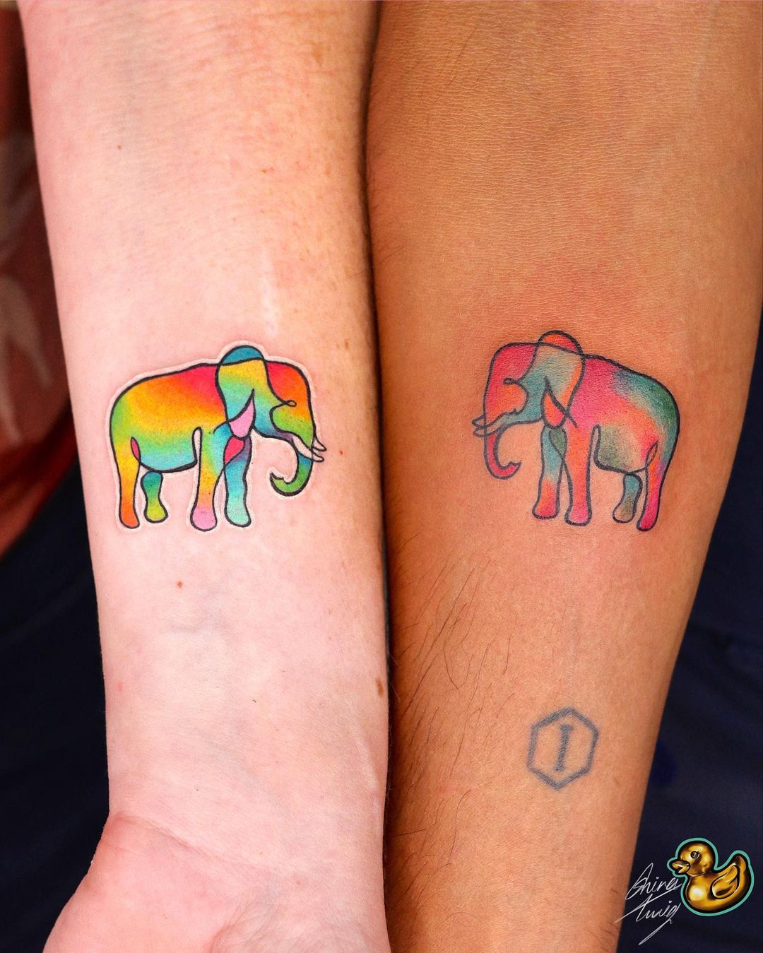 Matching Rainbow Elephant Tattoo