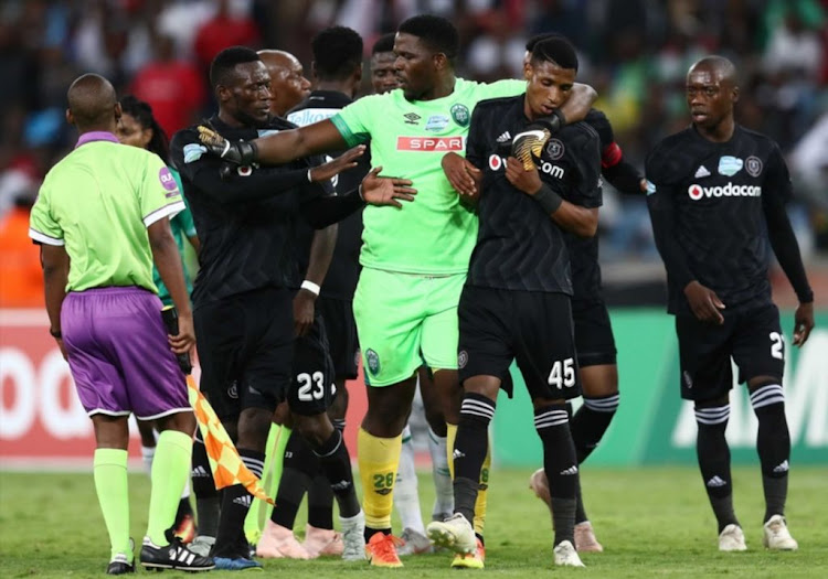 Siyabonga Mbatha of Amazulu FC and Vincent Pule of Orlando Pirates during the Telkom Knockout quarter final match AmaZulu FC and Orlando Pirates at Moses Mabhida Stadium on November 3 2018 in Durban.