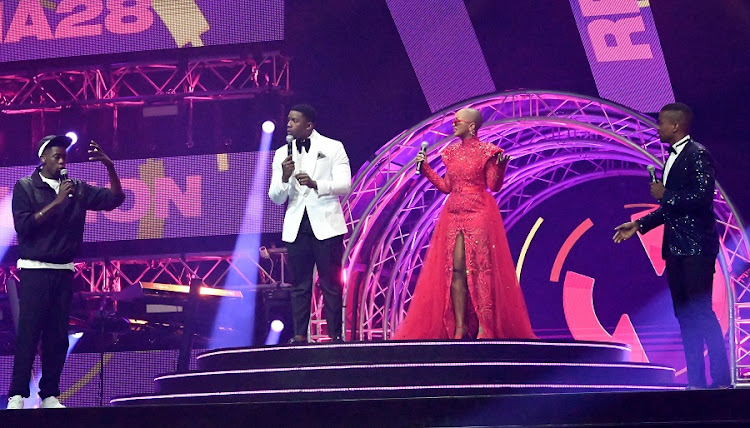 Robot Boii, Lawrence Maleka, Nandi Madida and Mpho Popps at the 28th annual SA Music Awards at the Sun City Superbowl.