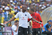 Rhulani Mokwena and Mlutin Sredojevic of Orlando Pirates and Themba Zwane of Mamelodi Sundowns during the Absa Premiership match between Mamelodi Sundowns and Orlando Pirates at Loftus Versfeld Stadium on January 13, 2018 in Pretoria, South Africa. 