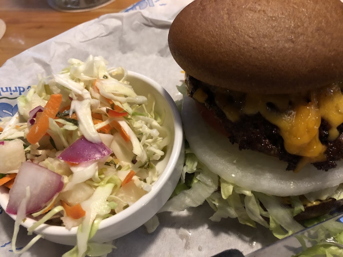 Gf big wave burger with cheese and gf bun and their slaw also gf